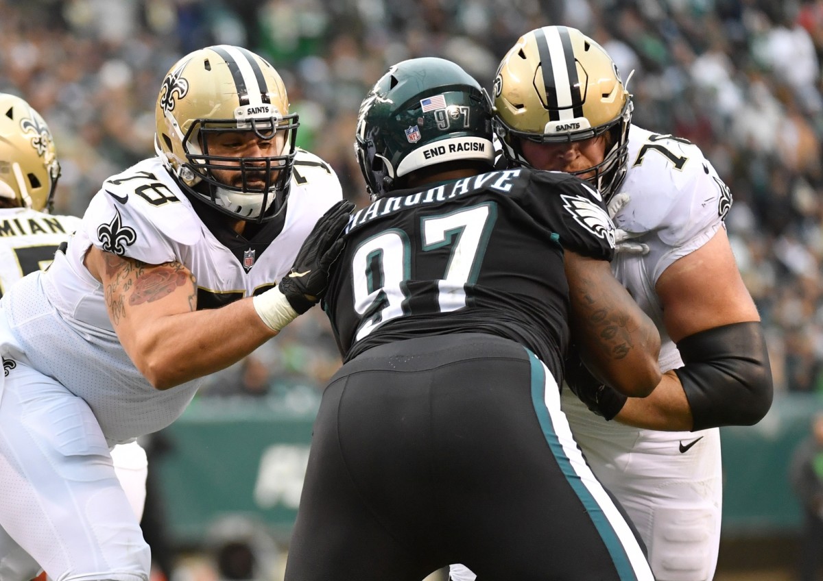 Nov 21, 2021; New Orleans Saints center Erik McCoy (78) and guard Calvin Throckmorton (76) block Philadelphia Eagles defensive tackle Javon Hargrave (97). Mandatory Credit: Eric Hartline-USA TODAY Sports